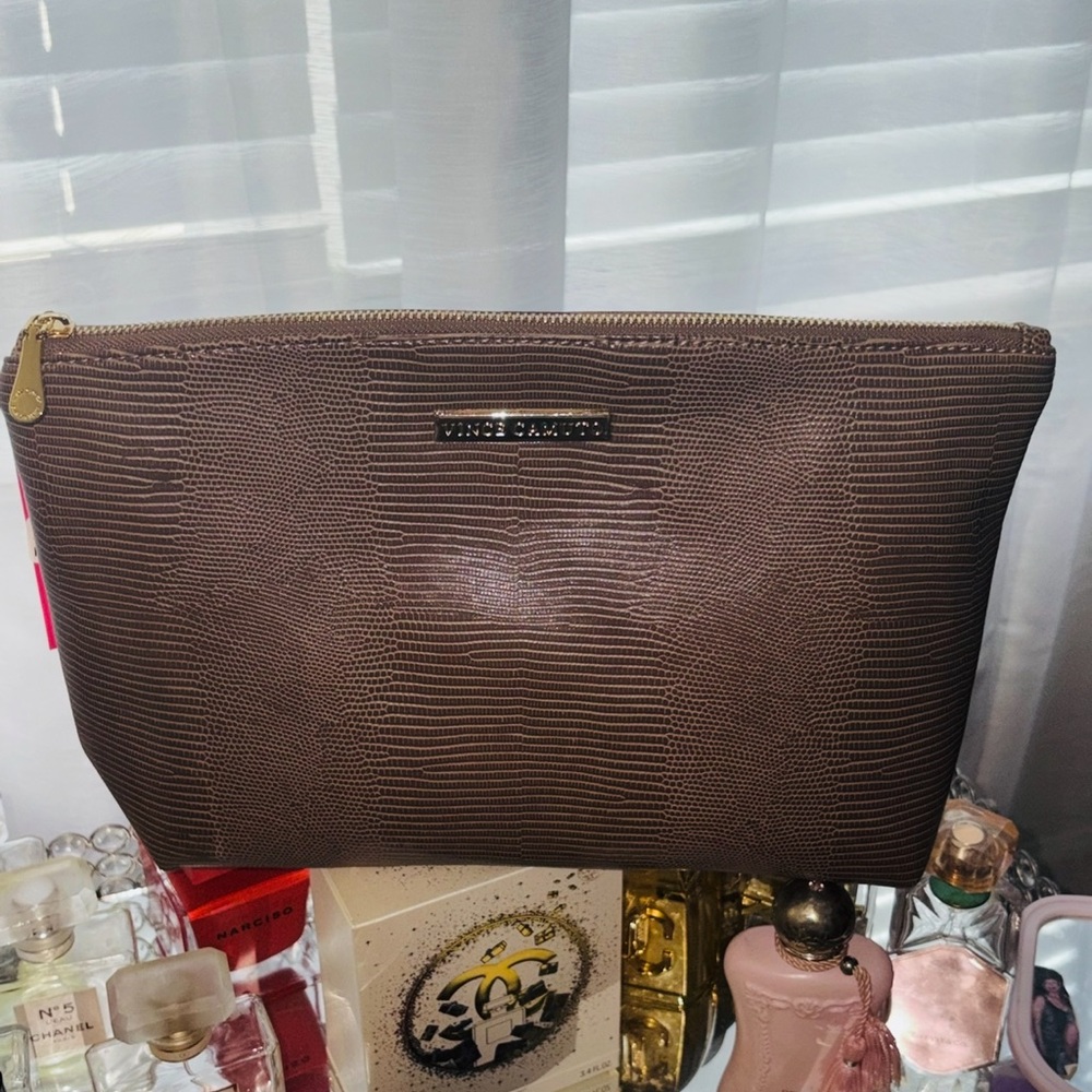 She likes certain Textured Brown pouch 👝 🤎